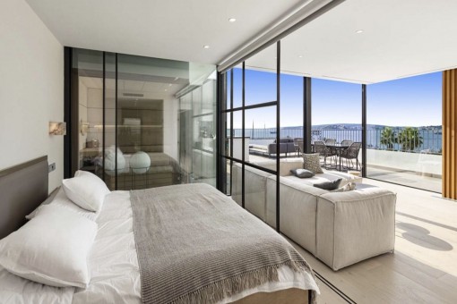 Open bedroom with sea views