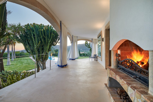 Terrace with exterior fireplace