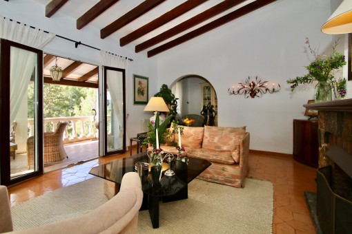 Bright living area with wooden beams