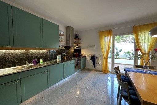 Open kitchen and dining area