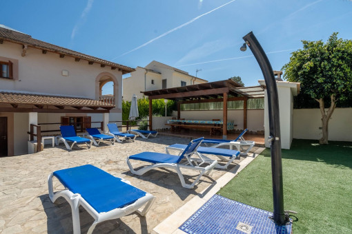 Sunny terrace with outdoor shower