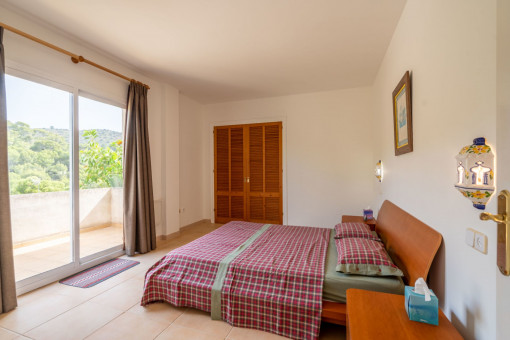 Bedroom with balcony access