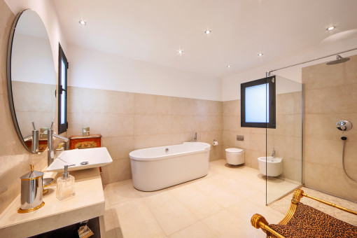 Bathroom with shower and bathtub