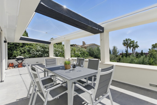 Spacious terrace area with BBQ and sea view
