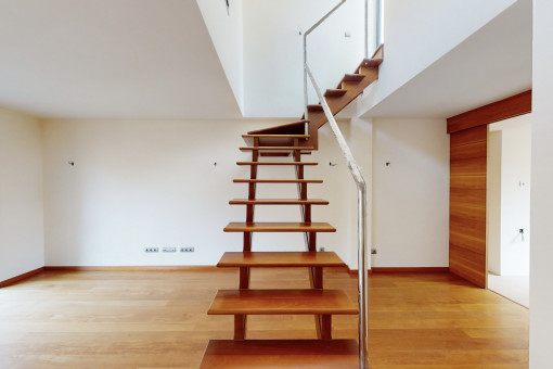 Elegant staircase leading to the rooftop terrace