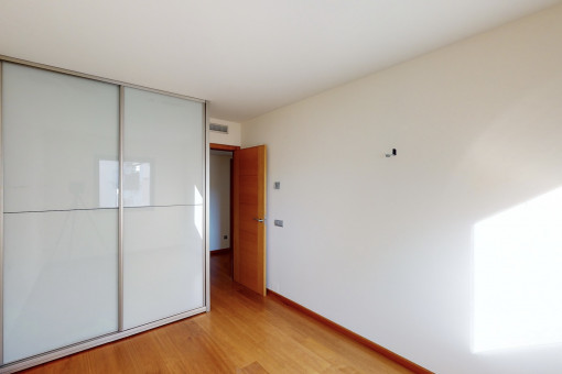 One of three bedrooms