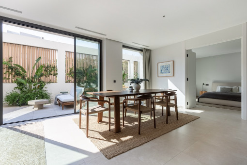 Bright living/dining area with access to the terrace