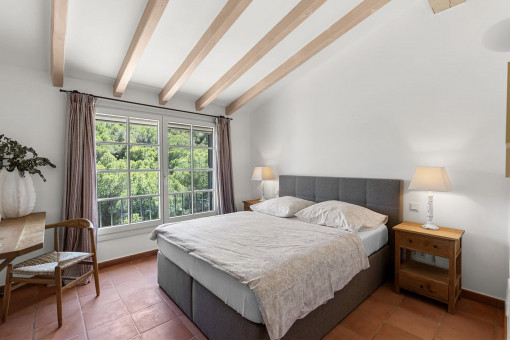 One of six bedrooms