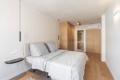 Spacious bedroom with built-in wardrobes