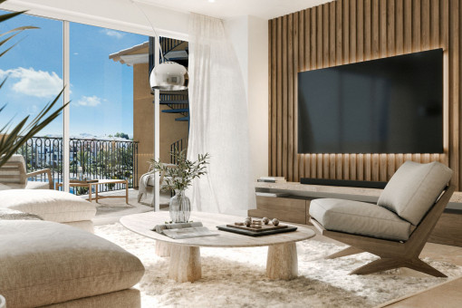 Top-floor living room with balcony and staircase to the roof terrace