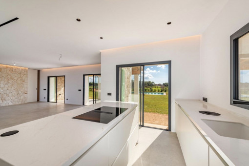 Open kitchen with views over the living and dining area