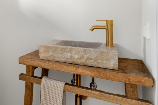 Bathroom with stone sink wash