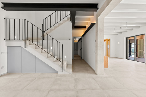 Entrance with stairs to the upper floor