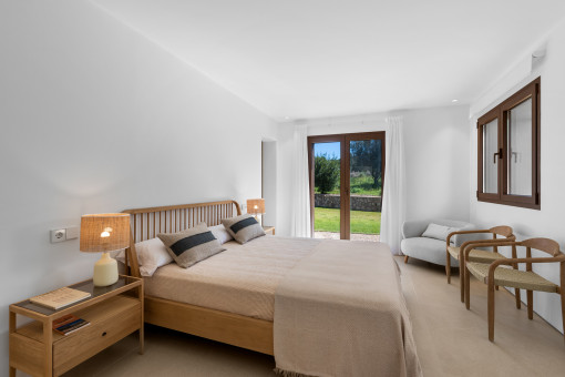 One of the 4 bedrooms with en suite bathroom and direct garden access