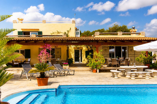 Large pool and terraces directly adjacent to it