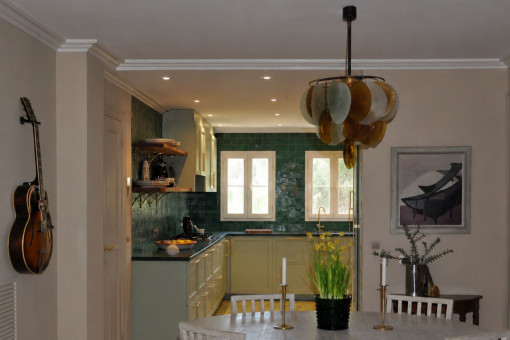 Living area and fully equipped Miele kitchen