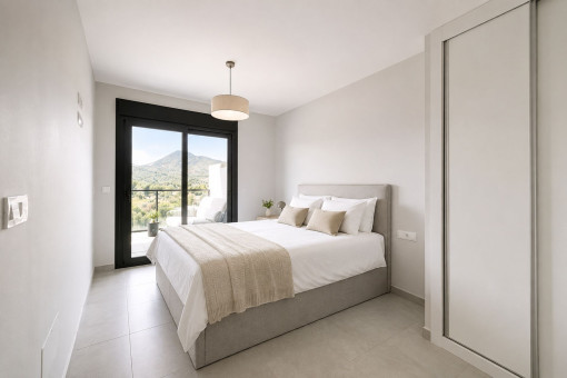 Main bedroom with access to the balcony