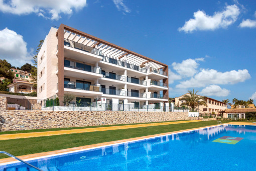 Modern residential complex with communal pool