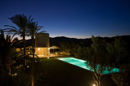 Illuminated pool area and garden