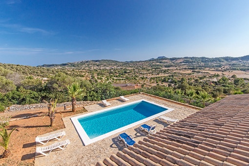 Pool area with sun terraces and wide views