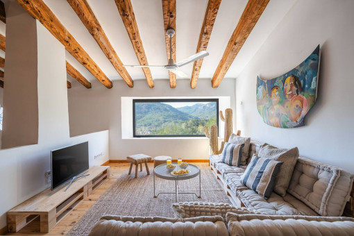 Cozy living-room with panoramic window and views of the Tramuntana mountains