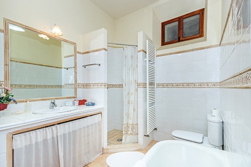 Bathroom with shower and bath tub