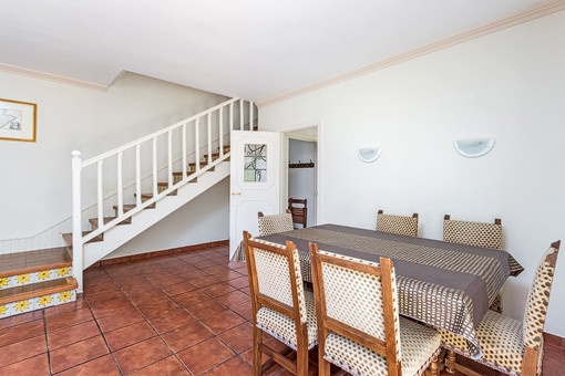 Dining area with staircase to the upper floor