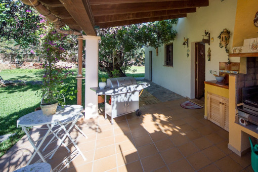 Covered terrace with barbecue