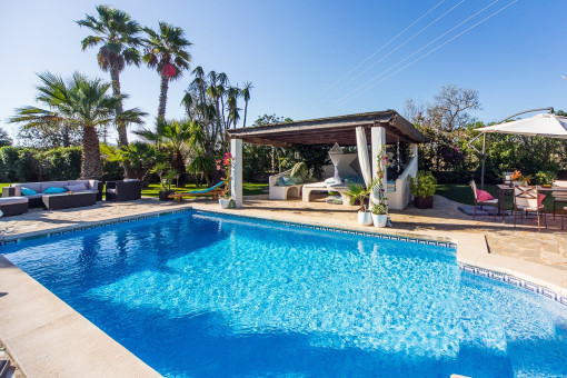 Pool area is surrounded by a terrace