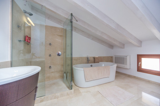 Master bathroom with bath tub and shower