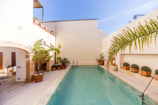 Inviting pool area surrounded by terraces