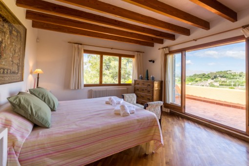 Spacious bedroom with access to terrace