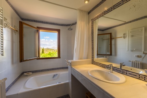 Bright bathroom with bath tub