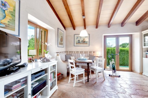 Light flooded living and dining area in the guest house