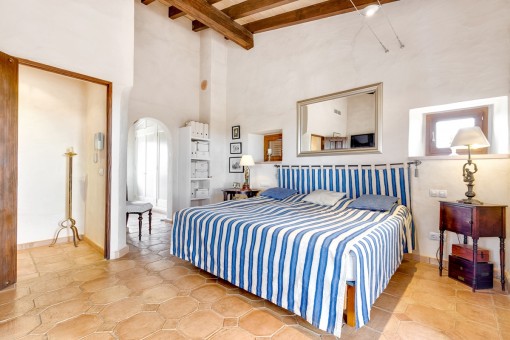 Master bedroom with bathroom and dressing room en suite