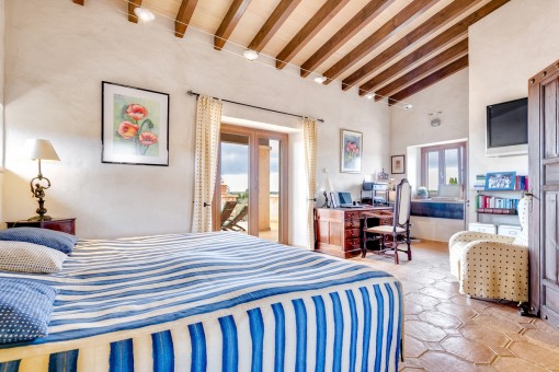 Spacious master bedroom with access to the terrace