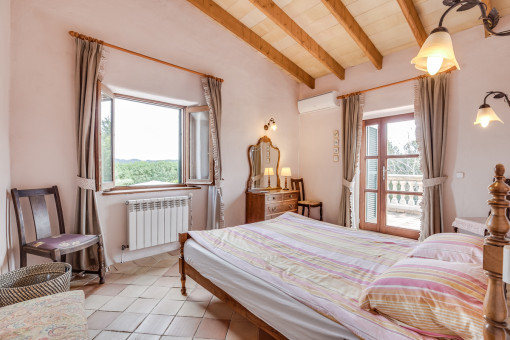 Cosy bedroom with terrace access