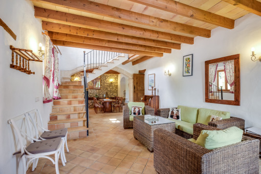Beautiful living and dining area with wooden ceiling beams