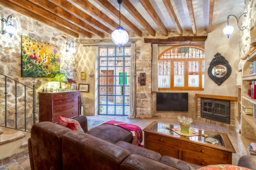 The living area offers a cosy fireplace
