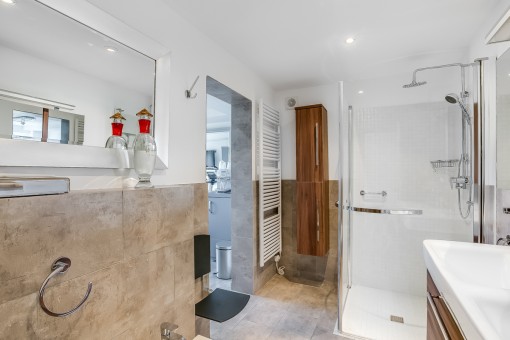 Bathroom leadin to a fitness room