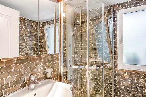 Beautiful bathroom with natural stone walls