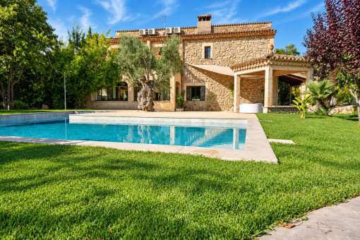 Well-tended garden with pool