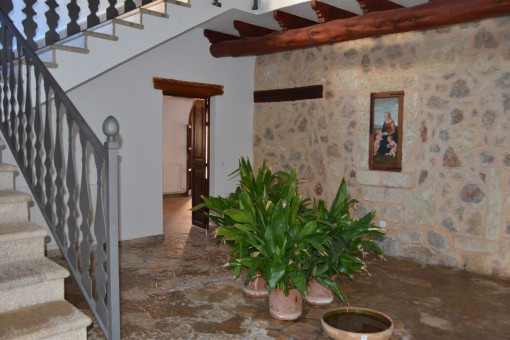 Entrance hall with stone wall
