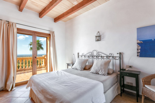Master bedroom with access to the balcony