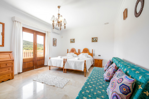 Bedroom with balcony access