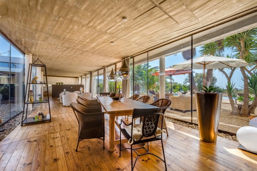 Living and dining area with large window front