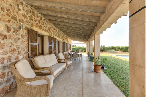 Covered terrace next to the pool