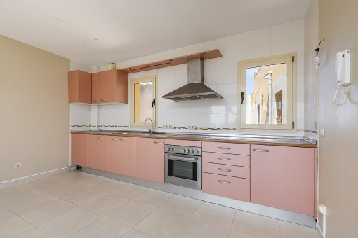 Open, fitted kitchen
