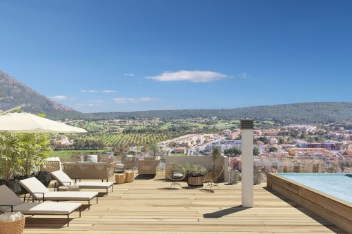 Sun loungers at the pool area 