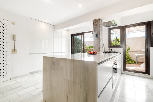 Modern kitchen with terrace access